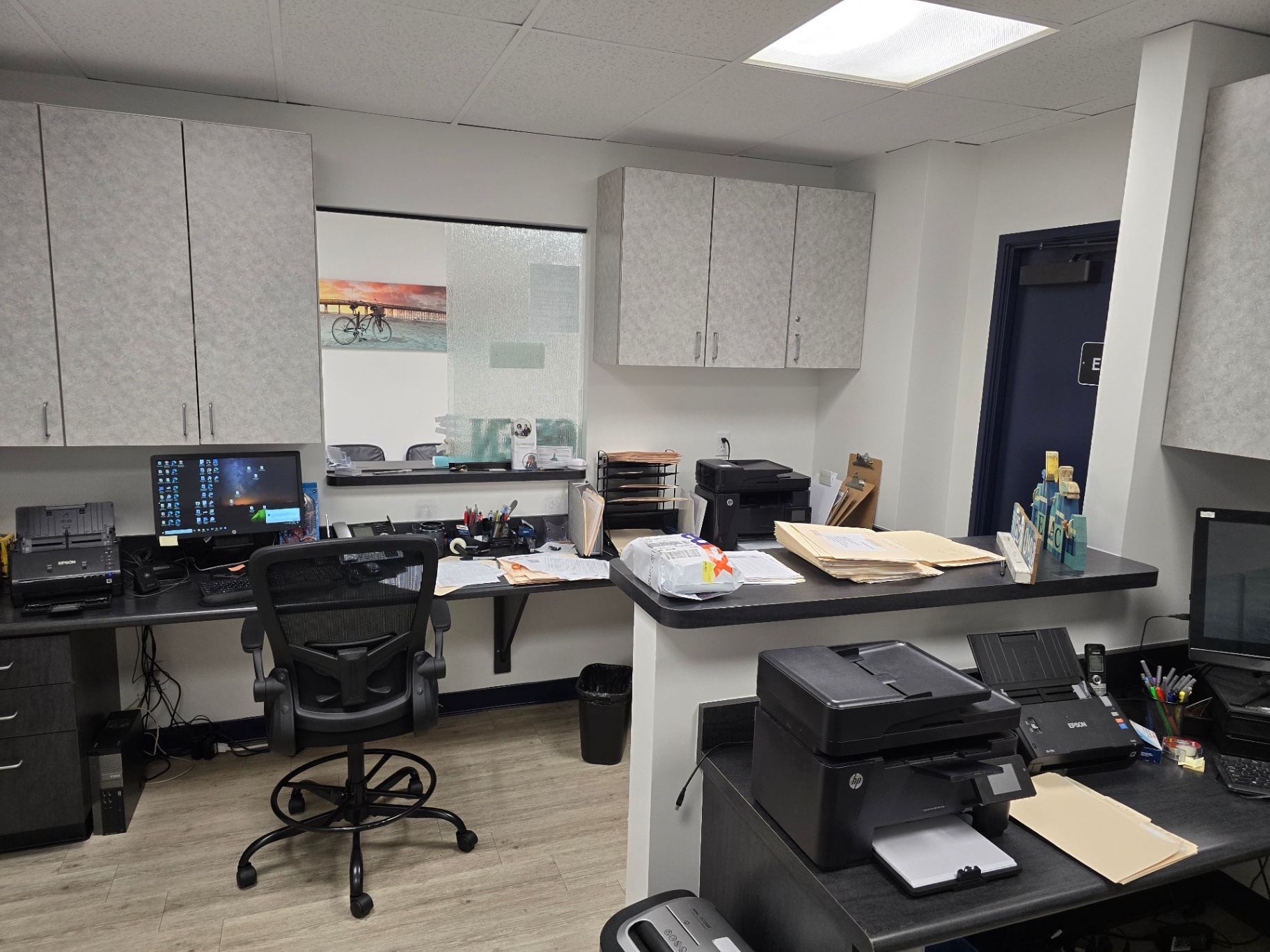 Front desk work area inside LA Hearing Diagnostics