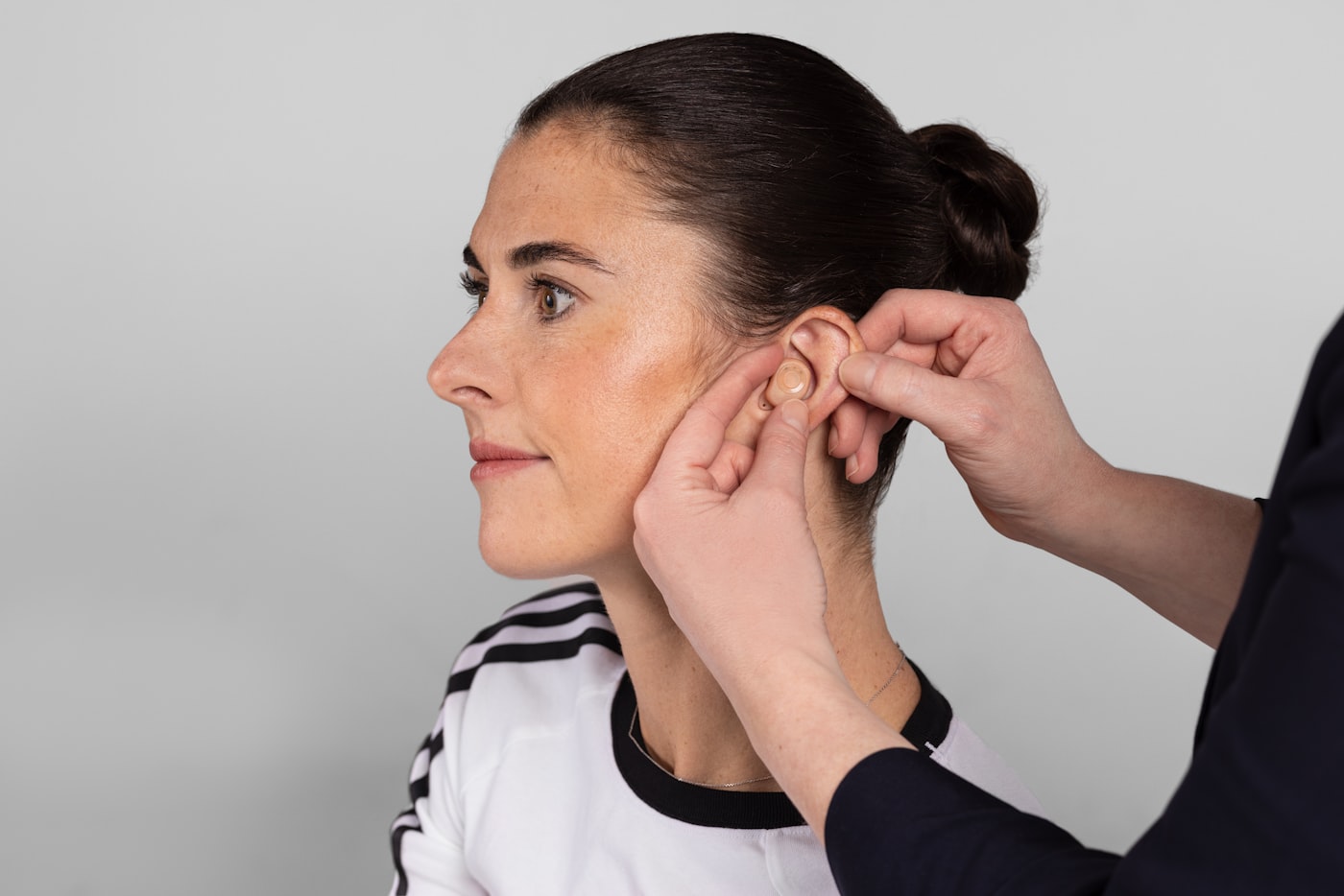 Modern hearing aids being fit and programmed